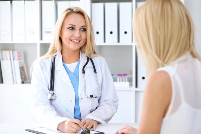 Medical staff attending a patient